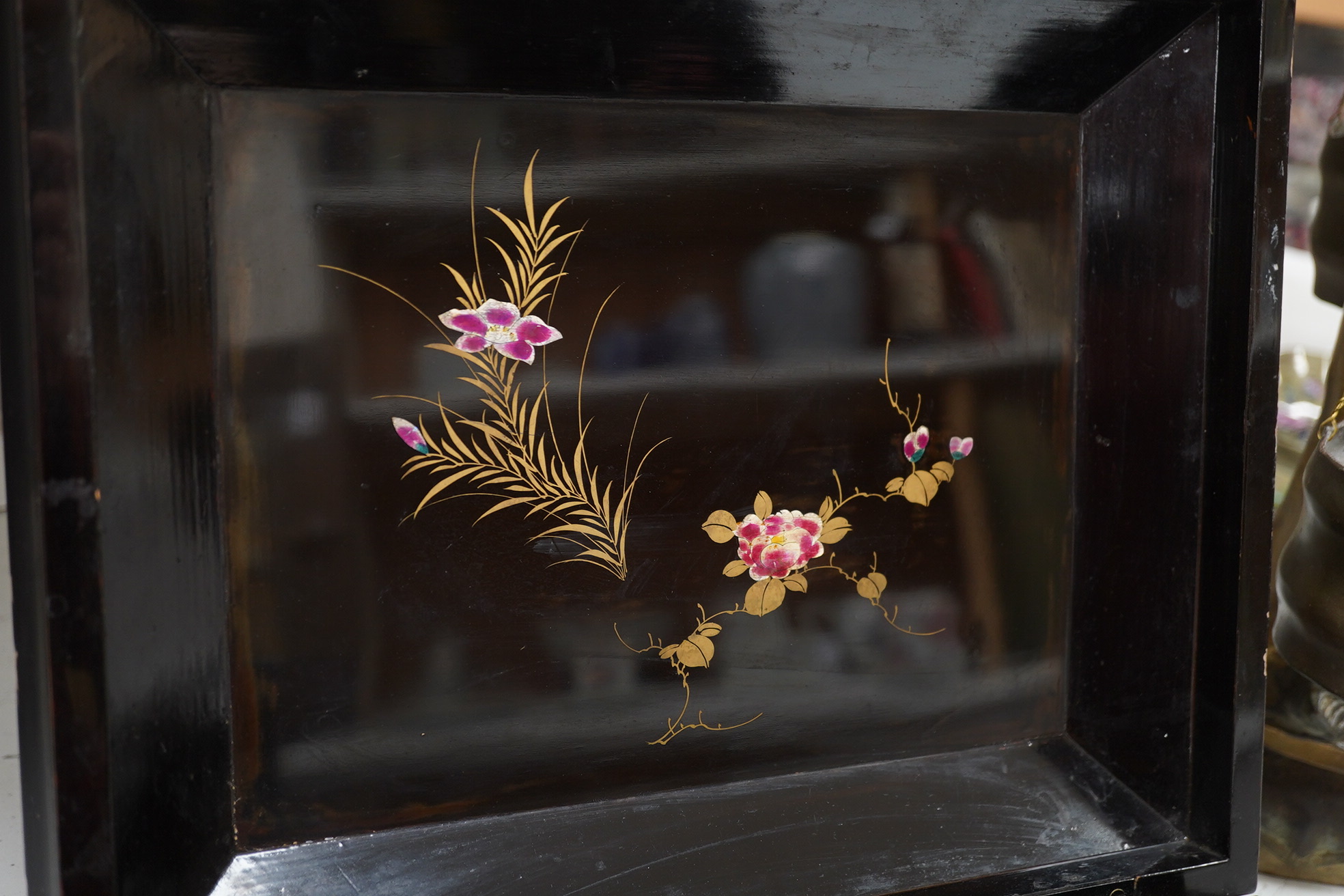 A Japanese lacquered box with mother of pearl inlay of birds and flowers, 35.5cm wide. Condition - worn on the outside to be expected, inside good